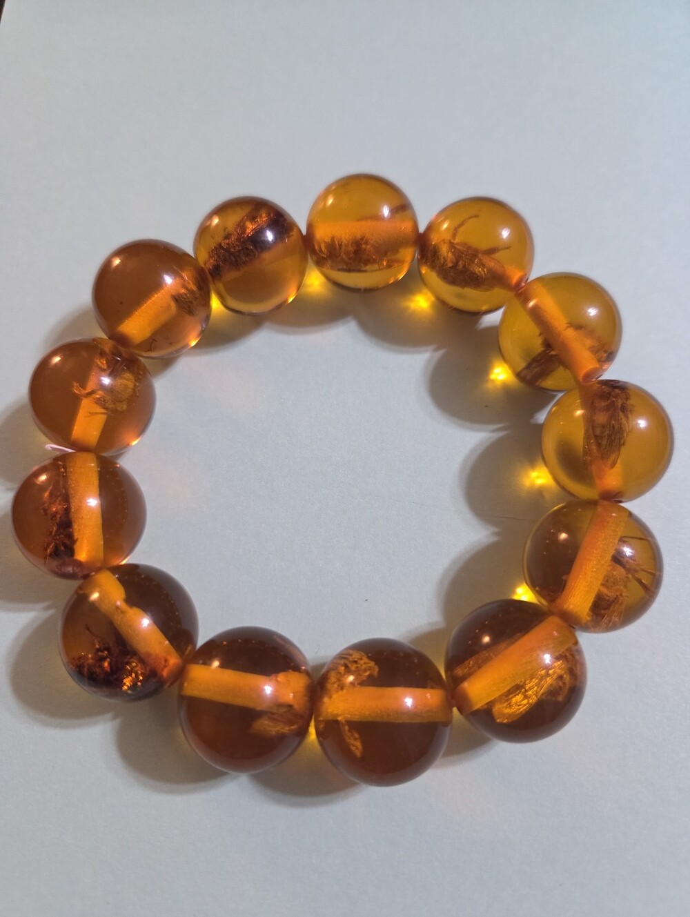 Amber-Colored Round Bead Stretch Bracelet with Preserved Bees